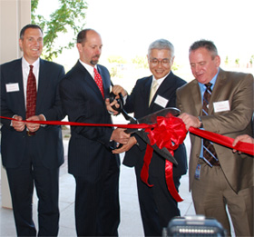 They cut the tape and opened the demonstration facility.